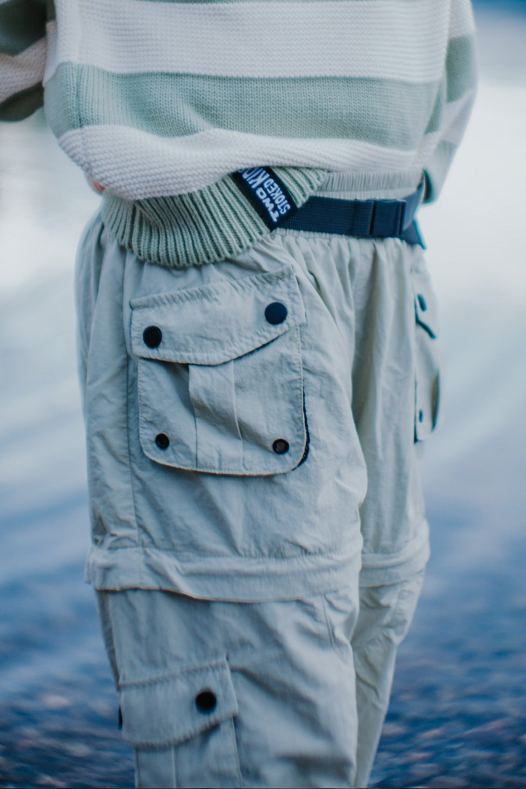 Convertible sage cargo pants for kids with elastic cuffs and zip-off design for warmer days