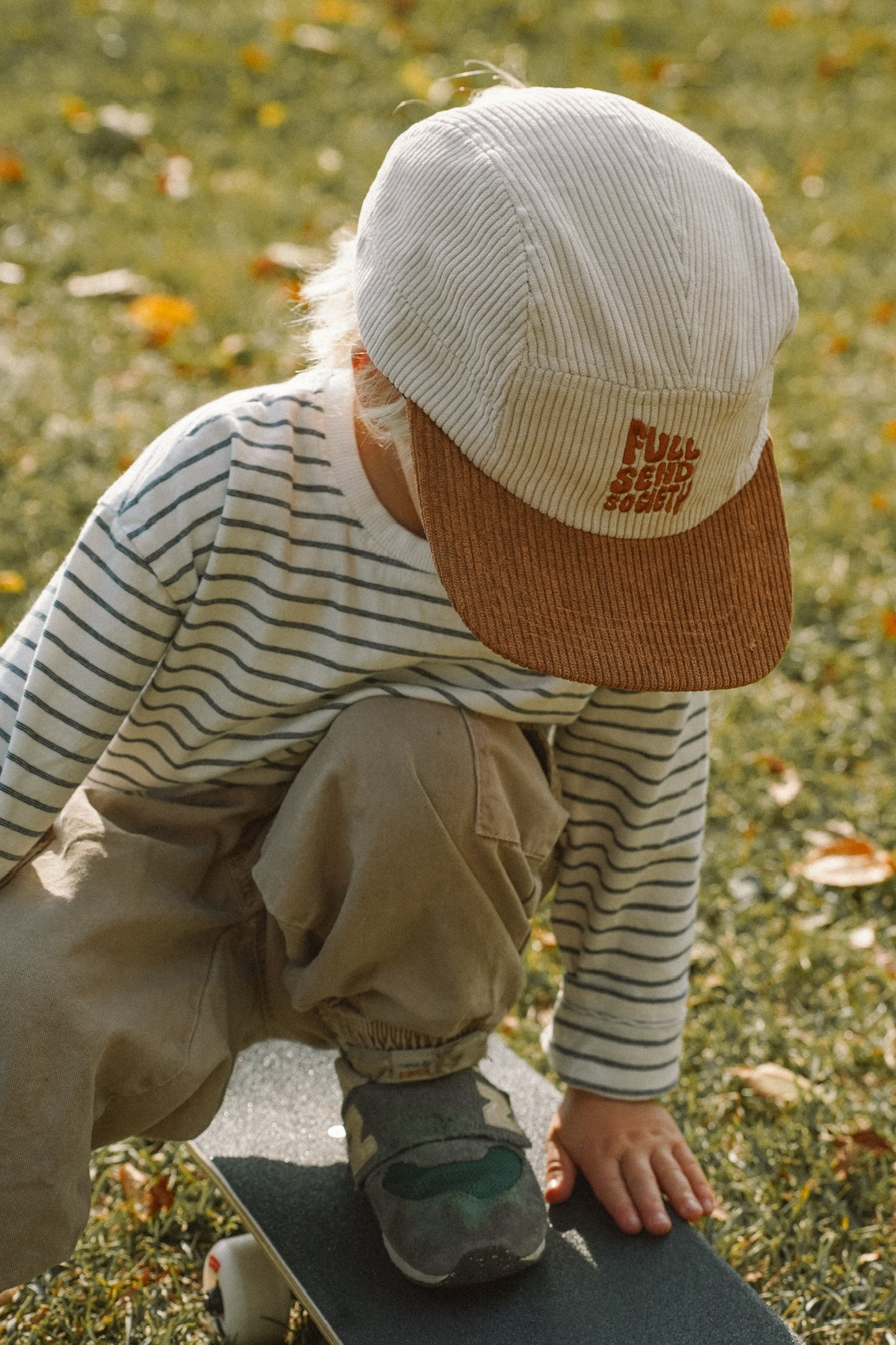 Kids 5 panel corduroy cap with adjustable back strap, made for outdoor play and daily adventures