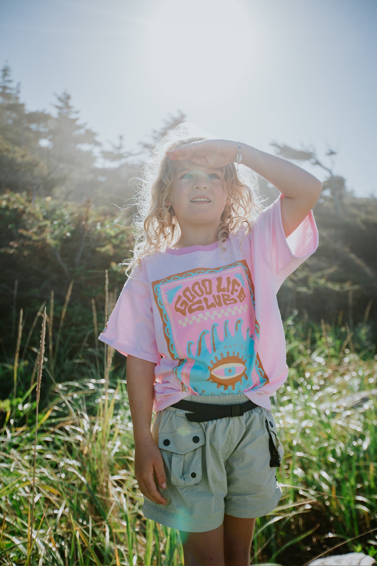 Child wearing Good Vibes cotton oversized t-shirt with relaxed fit in a summer style