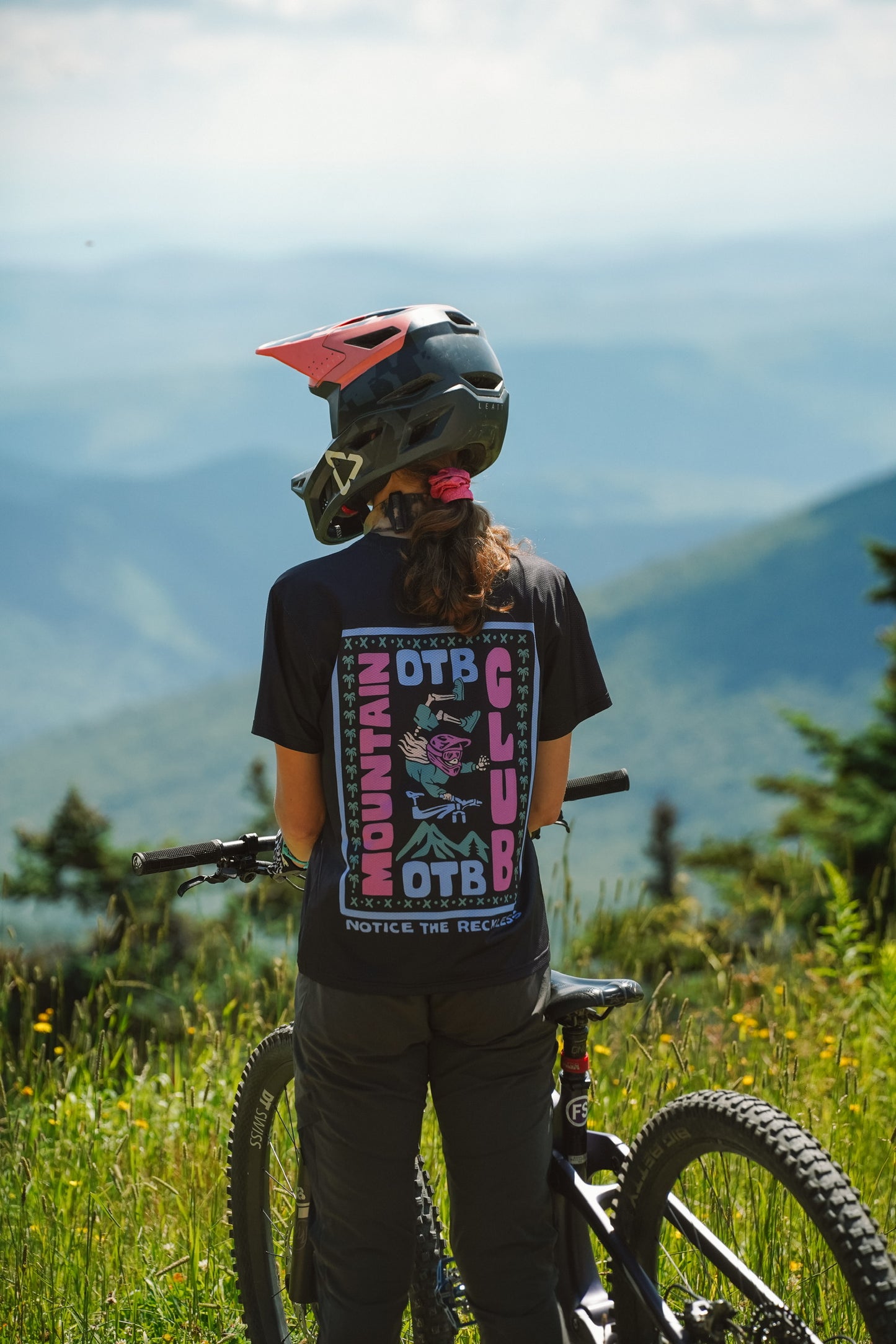 Women’s mountain bike jersey in black with OTB print and lightweight quick drying fabric