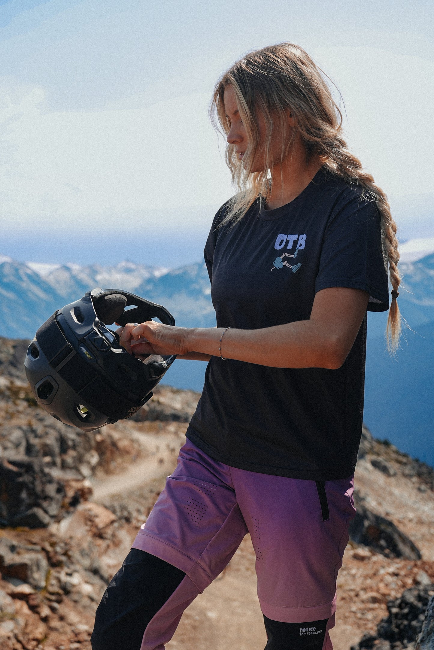 Black women’s MTB jersey with short sleeves featuring OTB design and moisture wicking material