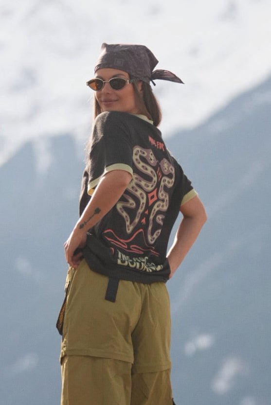 Women's charcoal merino wool hiking t-shirt with outdoor-inspired back graphic