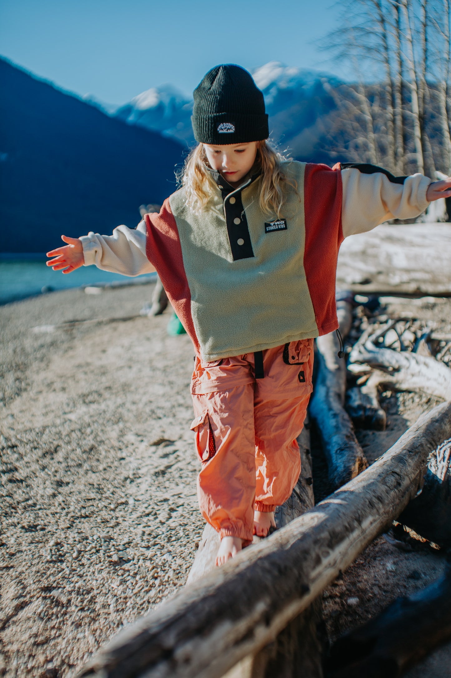 Kids oversized fleece pullover in green, rust and beige with colorblock design and snap placket