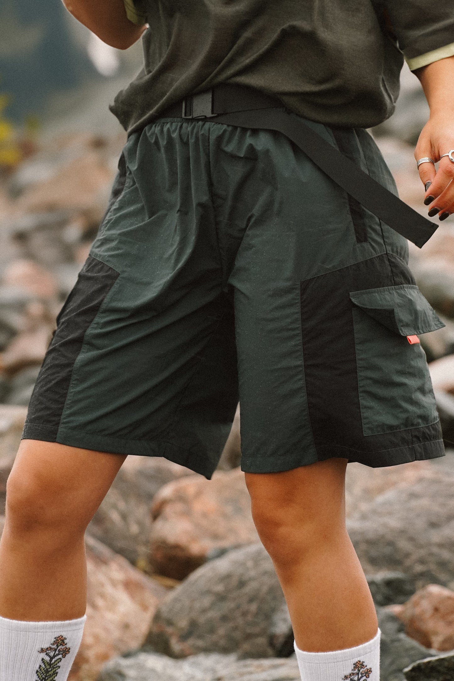 Women's Reckless hiking shorts with zip hand pockets worn during outdoor hiking