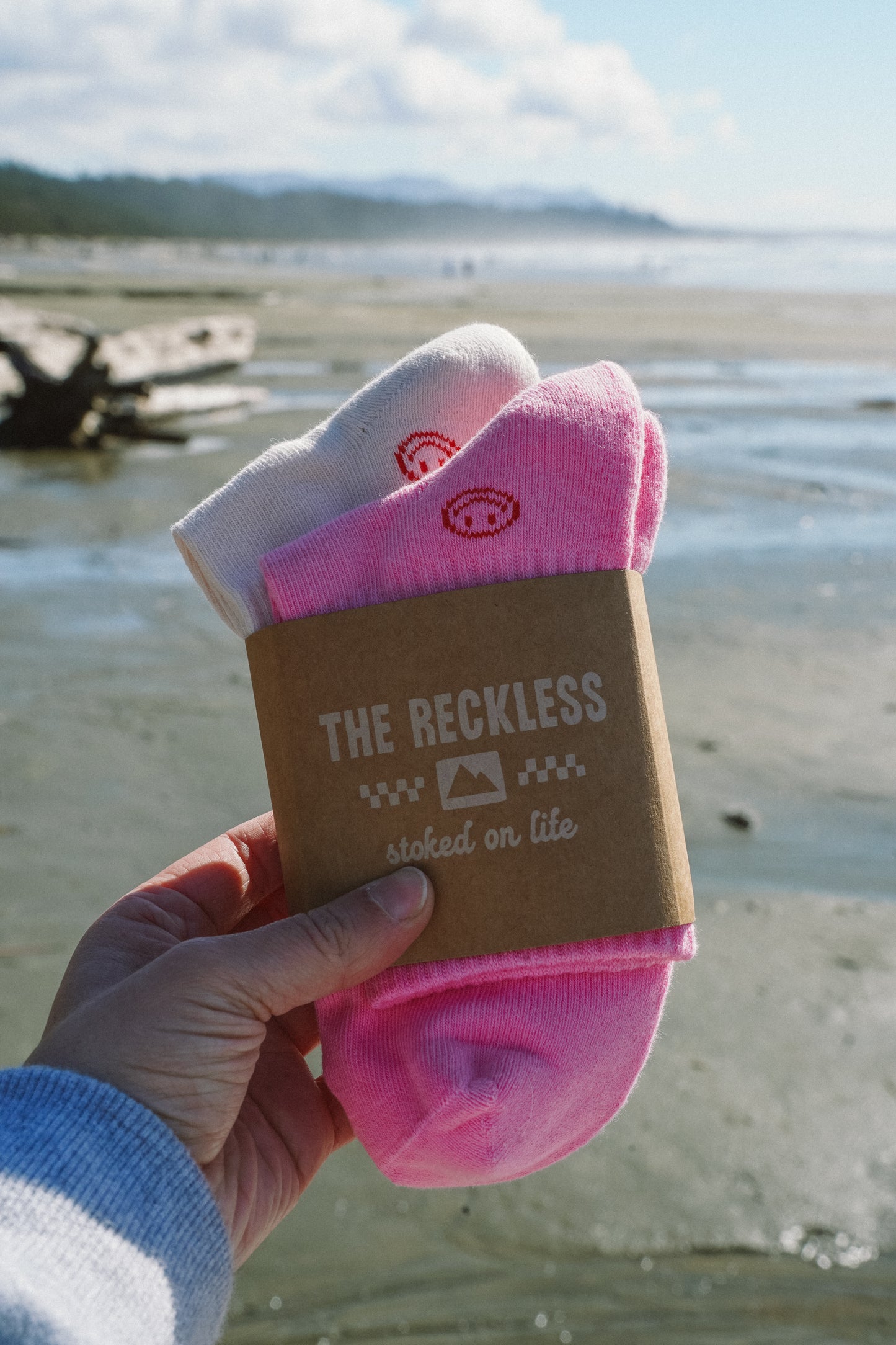 White and pink Solstice Socks crew socks duo pack with colorful accents