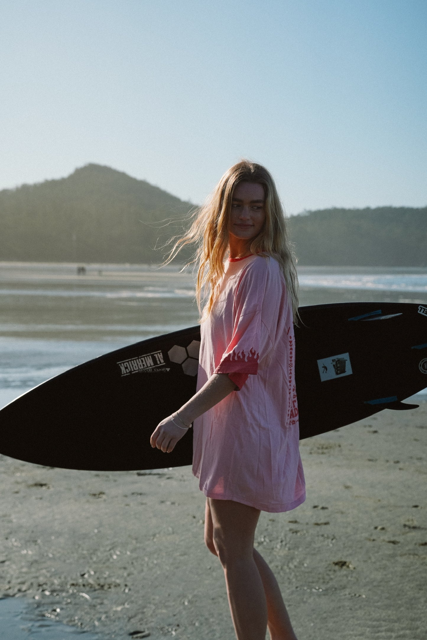 Summer cotton tee dress in pink with bold red print and casual silhouette