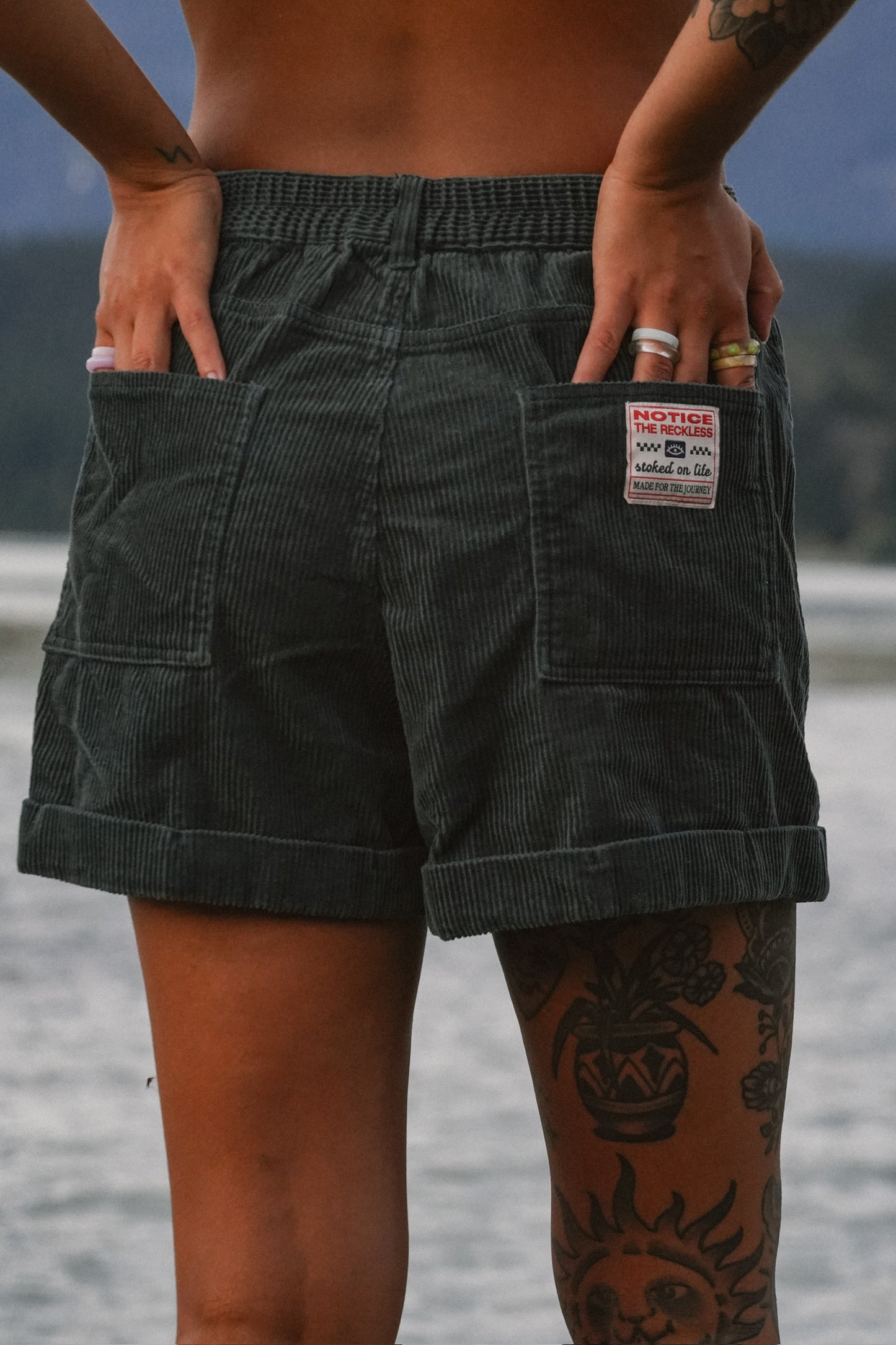 Women’s dark teal corduroy shorts with pockets and relaxed fit for summer