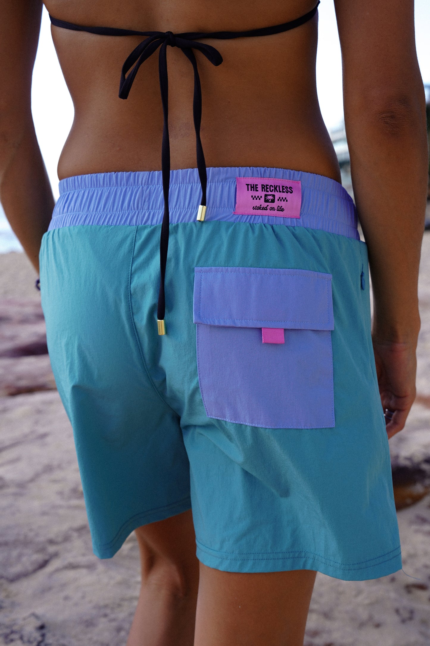 Blue-green cotton trekking shorts with adjustable waistband and pockets for summer hiking