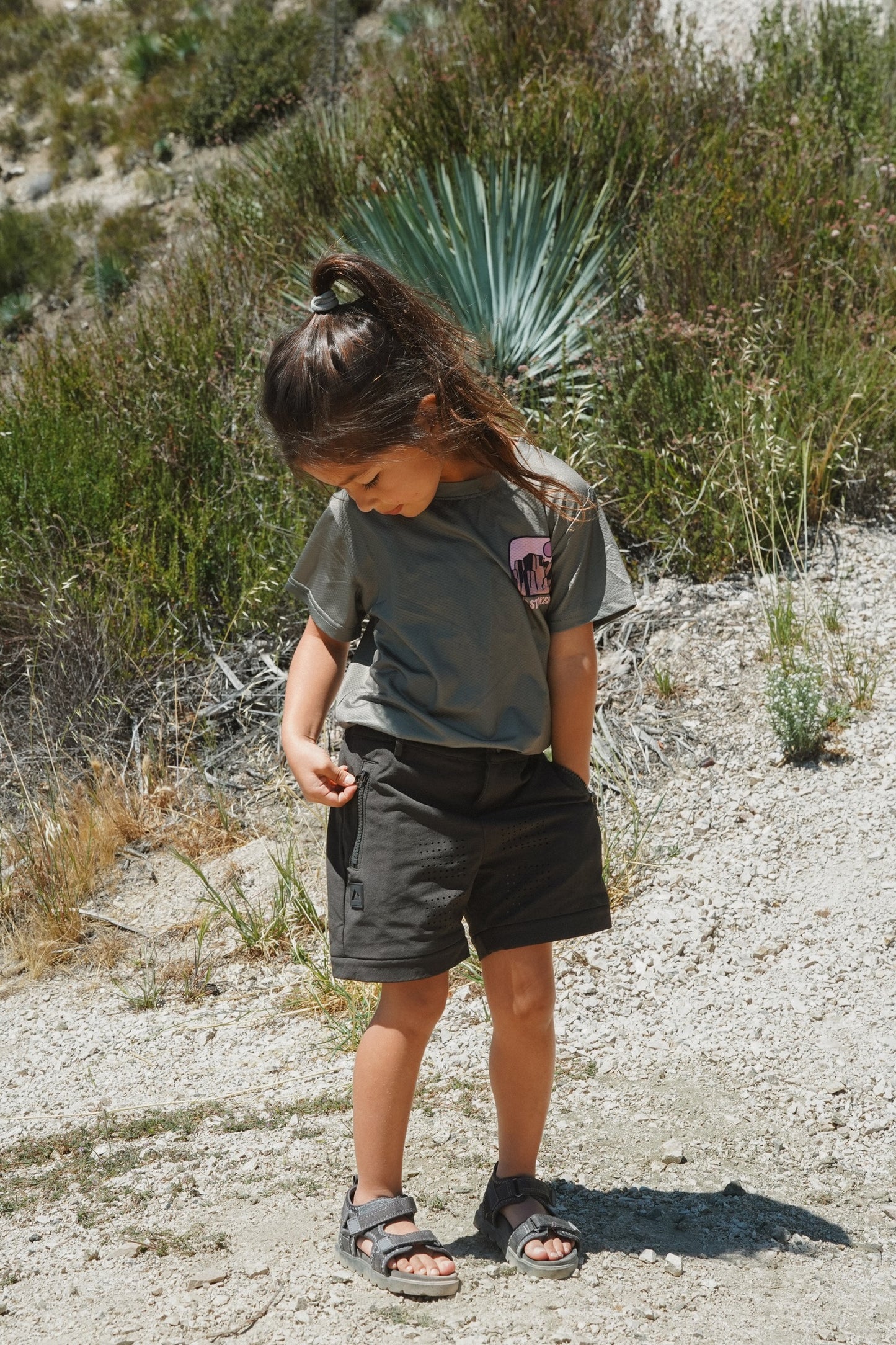 Breathable mountain bike pants for kids offering versatile zip-off styling and relaxed comfort for long outdoor riding days
